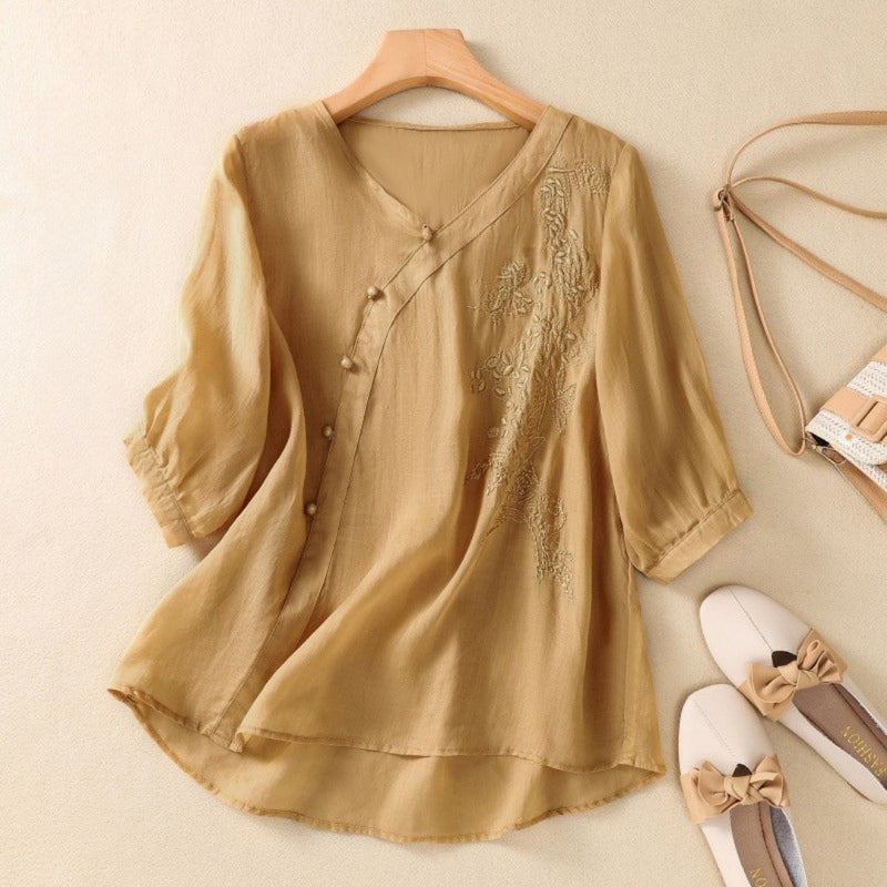 Elegant asymmetrisk tunika med knapper