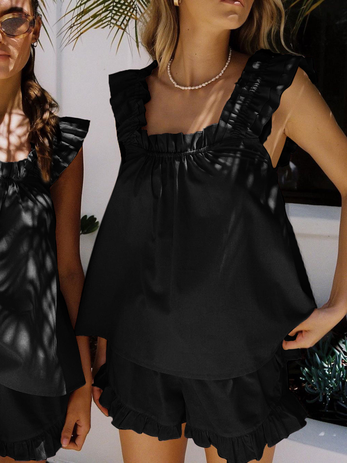 Ærmeløs top med afslappet pasform og flæser